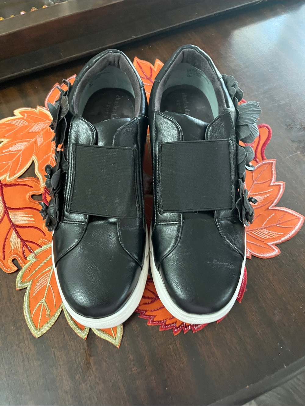 Women's Black Slip-On Athletic Sneakers with Floral Side Detail